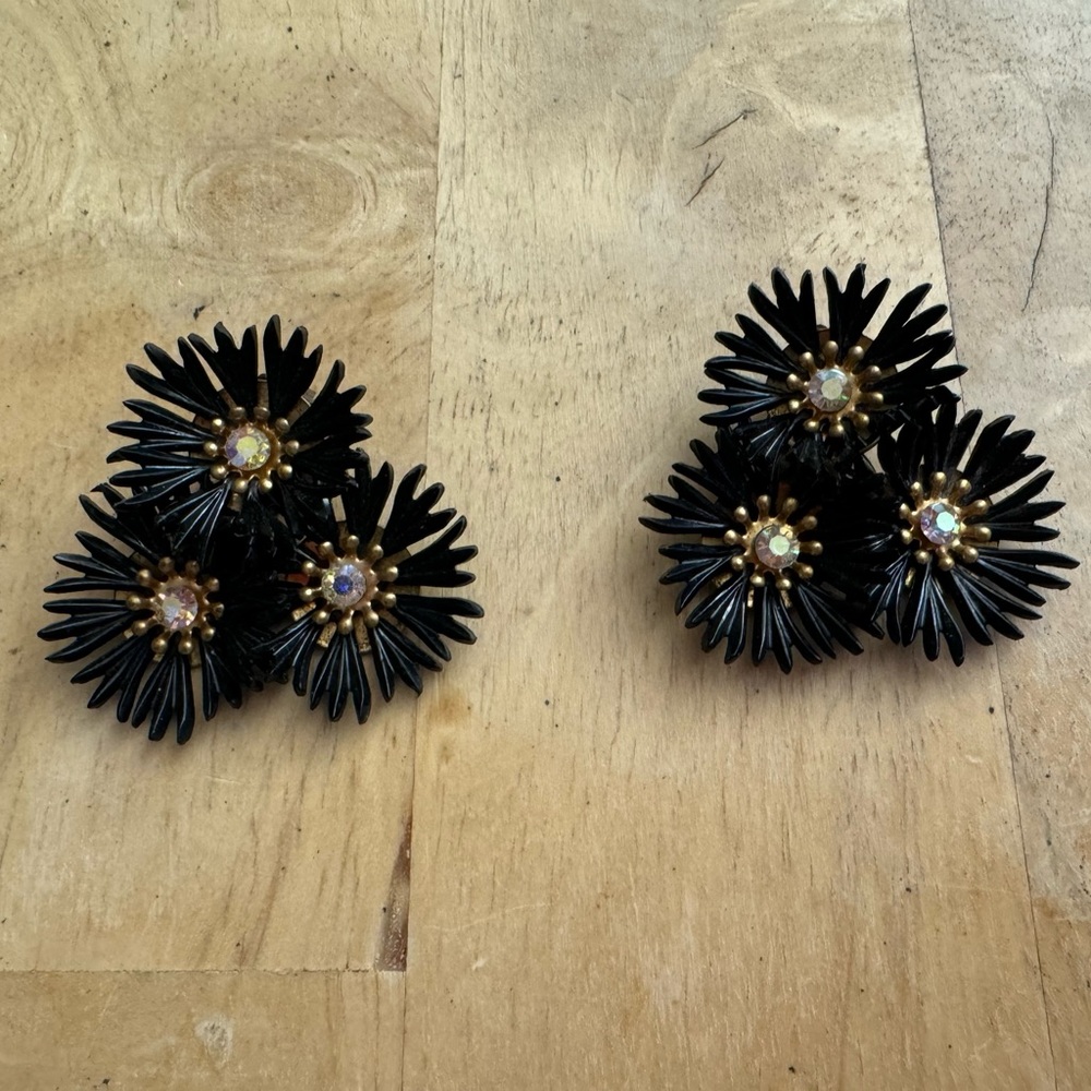 Black Floral Cluster Clip-On Earrings with Crystal Centers. 1 3/4” wide.